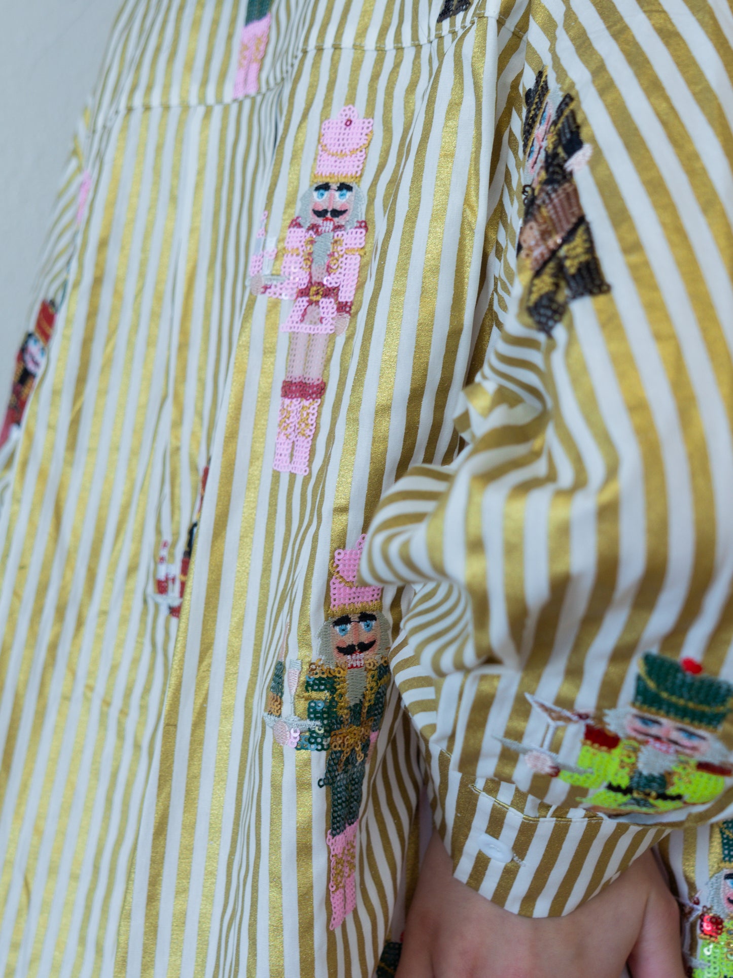 Queen of Sparkles Gold Metallic Stripe Serving Nutcrackers Button Up